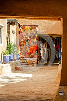 Alley with carpet stores in the Kasbah Ait Ben Haddou in Ouarzazate, Morocco October 2019
