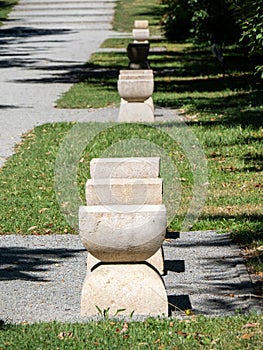 The alley of chairs, a work by Romanian sculptor Constantin Brancusi