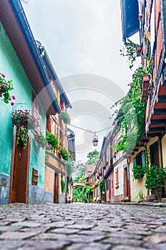 Alley with colorful houses in alsace