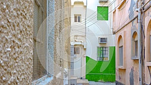 Alley and colorful traditional houses in Muharraq, Bahrain
