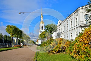 Alley on the embankment of the Kryukov canal and the belfry of S