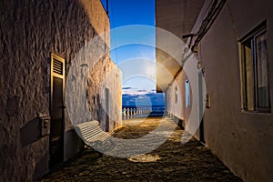 Alley in fishermen village in Fuerteventura at dusk