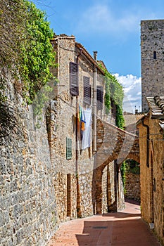 Alley with hanging laundry in an old Italian village