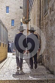 Alley in Jerusalem old city with two orthodox boys walking away