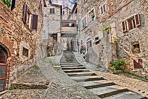 Alley in the medieval village Anghiari, Arezzo, Tuscany, Italy