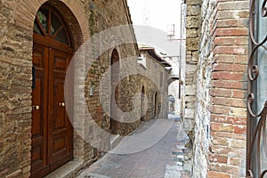Alley With Old Buildings In Italian City