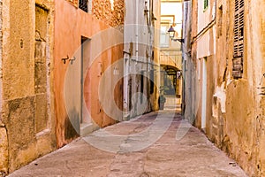 Alley with old houses in mediterranean town Felanitx on Majorca, Spain