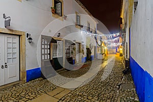 Alley in the old town, with Christmas decorations, Obidos photo