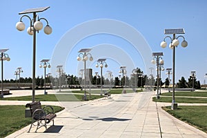 Alley in the park with a solar-powered lanterns