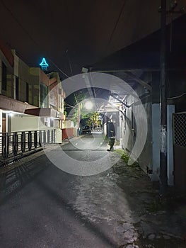 The alley with shinning light street