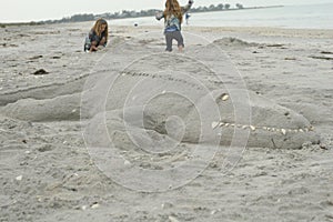 Alligator sculpture in the sand