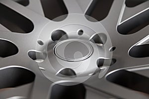 Alloy car wheels in forged aluminum with knitting needles and titanium silver. Auto service industry and spare parts