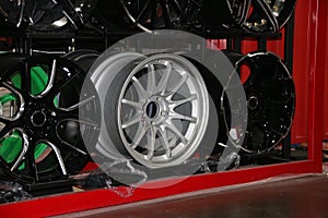 Alloy Wheel of car on the shelf. Alloy wheels are wheels that are made from an alloy of aluminium or magnesium.