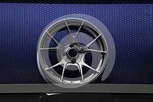 Alloy Wheel of car on the shelf. Alloy wheels are wheels that are made from an alloy of aluminium or magnesium. Alloys are