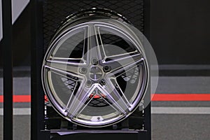 Alloy Wheel of car on the shelf. Alloy wheels are wheels that are made from an alloy of aluminium or magnesium. Alloys are