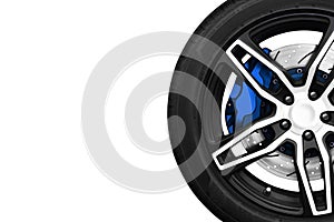 Alloy wheels of racing car with metal brake discs and blue caliper on a white colored background with copy space your writing tex