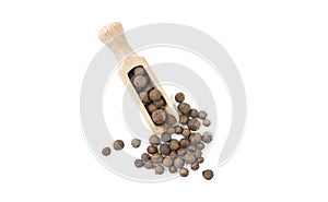 Allspice jamaican pepper in wooden scoop isolated on white background. top view. spices and food ingredients