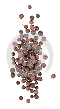 Allspice pile isolated on white background. Jamaican pepper, pimento berry, allspice peppercorns or myrtle pepper. Top