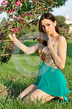 Alluring brunette sitting