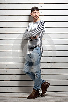 Alluring young brunette posing in studio