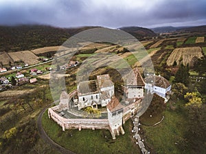 Alma Vii saxon fortified Church in Transylvania, Romania photo