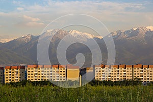 Almaty city panoramic view, Kazakhstan. Cloudy sky, mountains