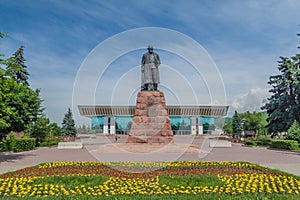 ALMATY, KAZAKHSTAN - JUNE 1, 2017: Abai Qunanbaiuly Abay Kunanbayev monument in Almaty, Kazakhstan. Republic Palace in the