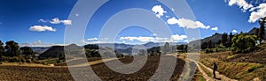 On the way to the cerro Quemado, Panoramic view on the surrounding fields and mountains, Quetzaltenango, Guatemala photo