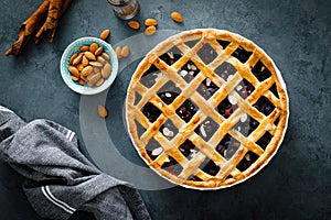 Almond and berry pie with lattice pastry, flat lay, top view