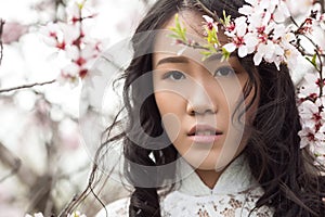 Almond blossoms - Portrait Vietnamese girl in Ao Dai