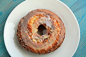 Almond bunt cake on plate centered