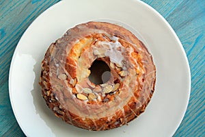 Almond bunt cake on plate centered photo