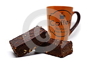 Almond chocolate brownie with coffee cup