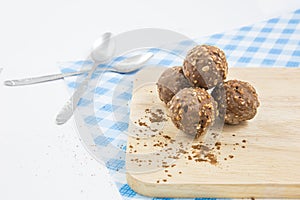 Almond chocolate candy isolated on wood