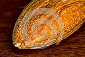 Almond in detail on wooden table