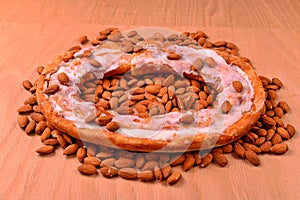 Almond Flavored Kringle on a bed of nuts