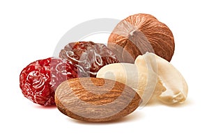 Almond, hazelnut, peanut, raisin and cranberry isolated on white background. Nut and berry mix photo