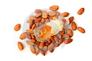 Almond and honey are in the bottle. White background set. top view