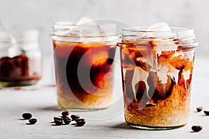 Almond Milk Cold Brew Coffee Latte in glass jars