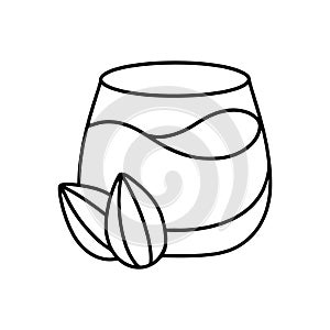 Almond milk doodle icon. Linear sketch emblem. Glass of vegan nutty drink. Black simple illustration for label design of natural