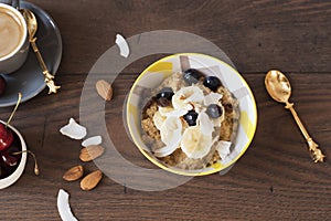 Almond Milk Quinoa With Fresh Fruits, Cherries And Coffee. Healthy Breakfast, Lifestyle Concept. Top View. Dark Wooden Background.