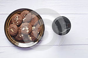 almond nut chocolate cookies on wooden table