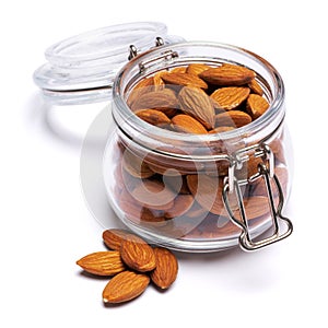 Almond nuts in a glass bowl isolated on a white background