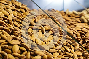 Almond nuts in grocery. Healthful raw food for people with lactose intolerance and vegetarians. Healthy eating