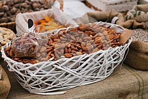 Almond is on sale in the store. Useful and tasty nut.