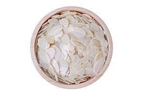 Almond slice in wooden bowl