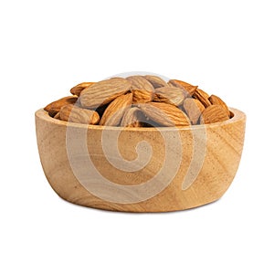 Almond in wooden cup isolated on white background with clipping path