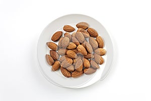 almonds,almond group, almonds in white dish on over white background