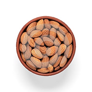 Almonds in a bowl isolated on a white background. Top view. Healthy food concept