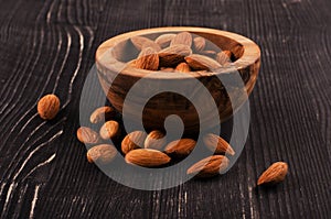 Almonds in brown bowl